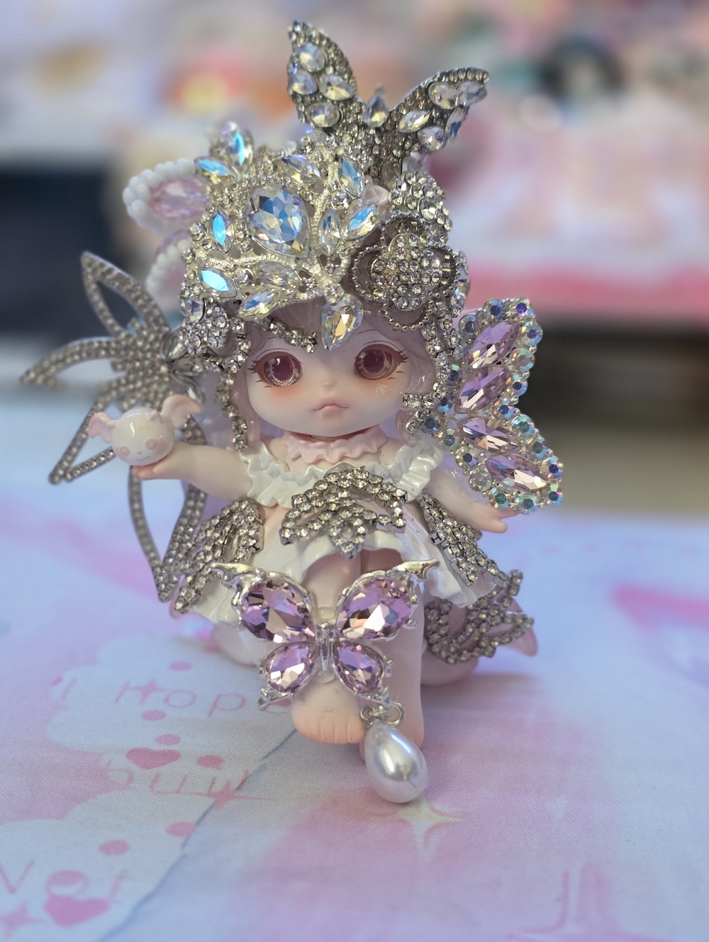 Sparkling Flora With Bat Figurine